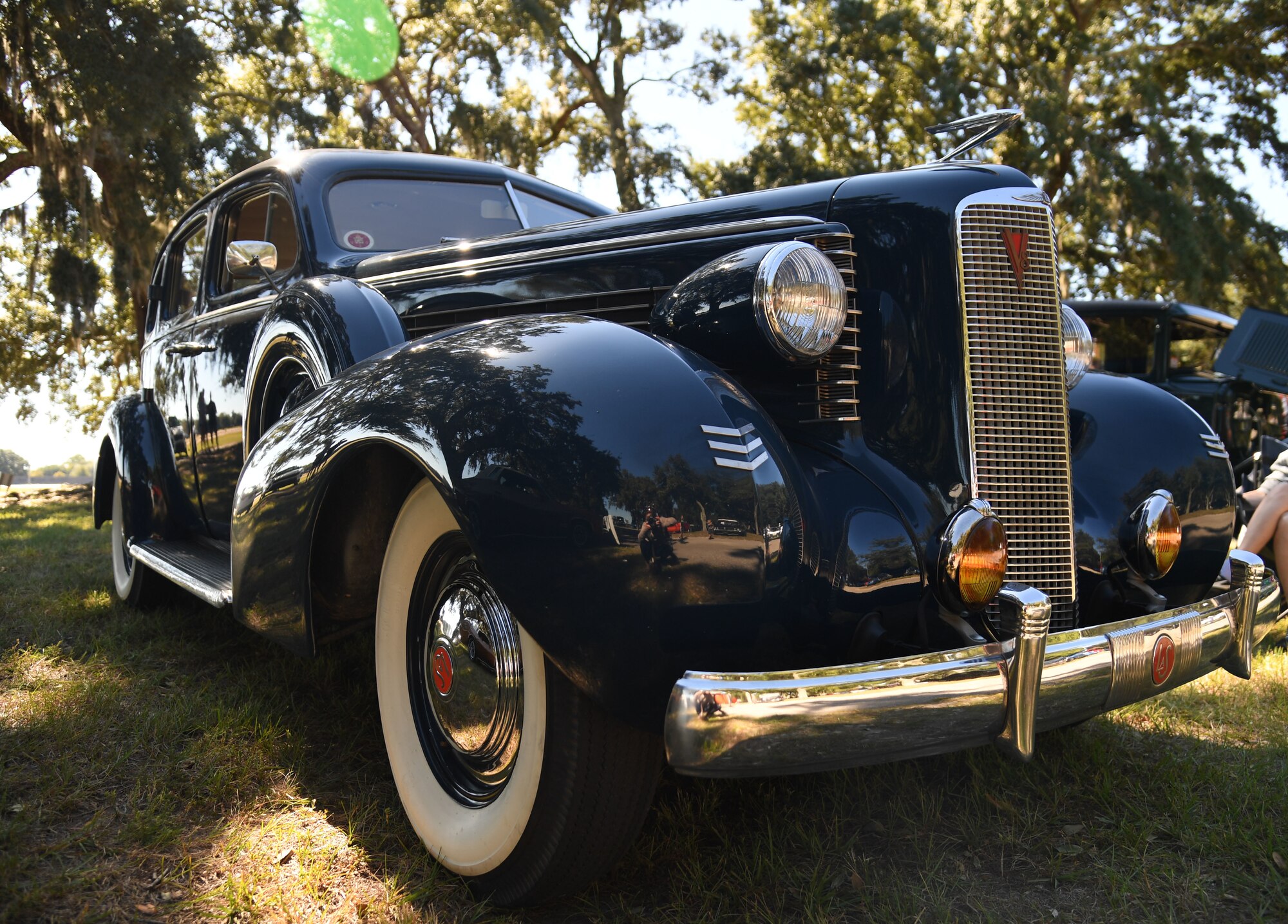 An antique car is on display during the 19th Annual Cruisin' Keesler Car Show and Parade at the Marina Park at Keesler Air Force Base, Mississippi, October 1, 2022. The event is held to kick off Cruisin' the Coast, a festival to celebrate classic cars, trucks and hot rods, where vehicles cruise down the 30-mile beachside highway in Mississippi. (U.S. Air Force photo by Kemberly Groue)