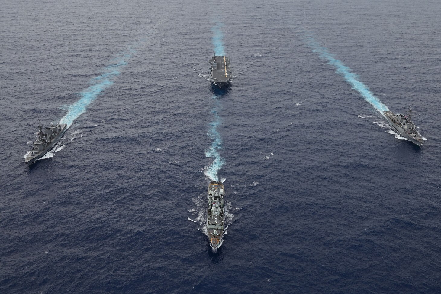 Arleigh Burke-class guided-missile destroyer USS Higgins (DDG 76), cruises in formation with Izumo-class multi-purpose destroyer JS Izumo (DDH 183) and a Japanese submarine while conducting routine operations in the South China Sea, Oct. 1. Higgins is participating in multi-lateral exercises in the South China Sea in support of the Japan Maritime Self-Defense Force’s Indo-Pacific deployment, along with the Royal Canadian Navy. Routine multi-lateral exercises like this strengthen interoperability and our mutual commitment to maintaining a free and open Indo-Pacific.