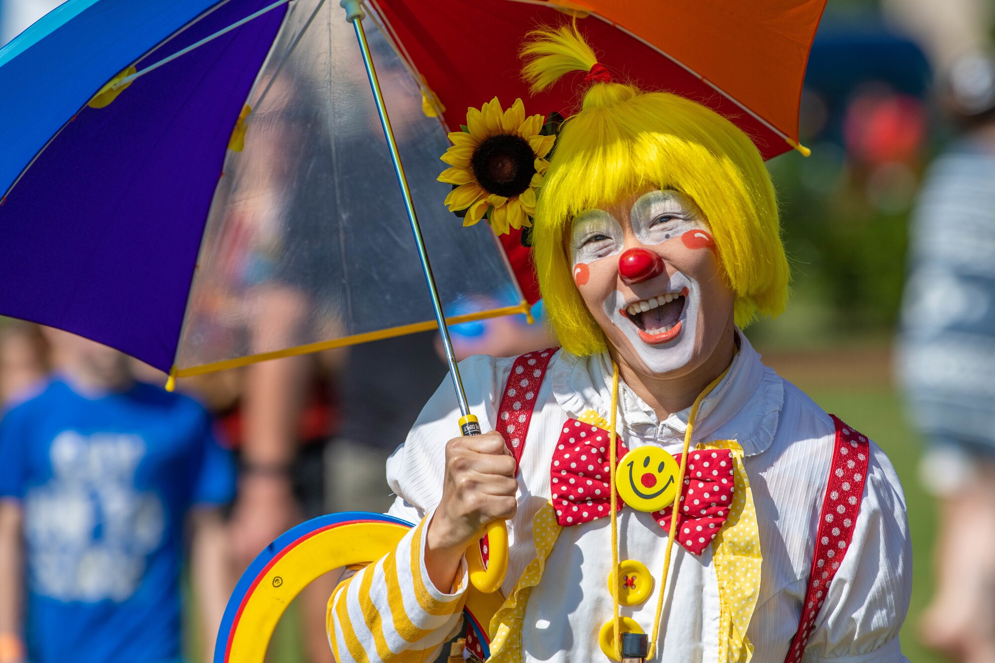 A local performer poses for a photo