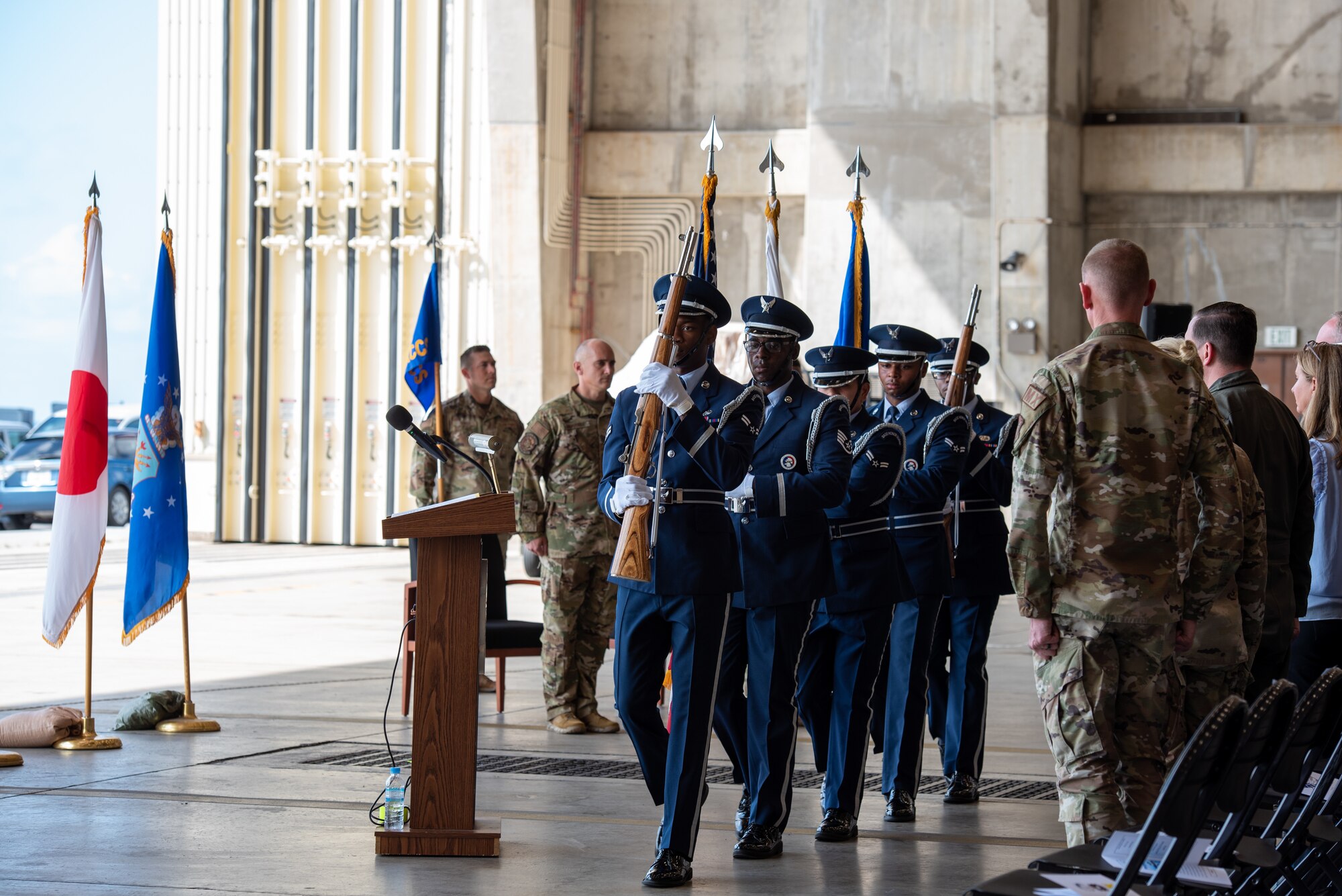 Airmen from the Kadena Honor Guard present the colors during the 5th Expeditionary Airborne Command and Control Squadron deactivation ceremony