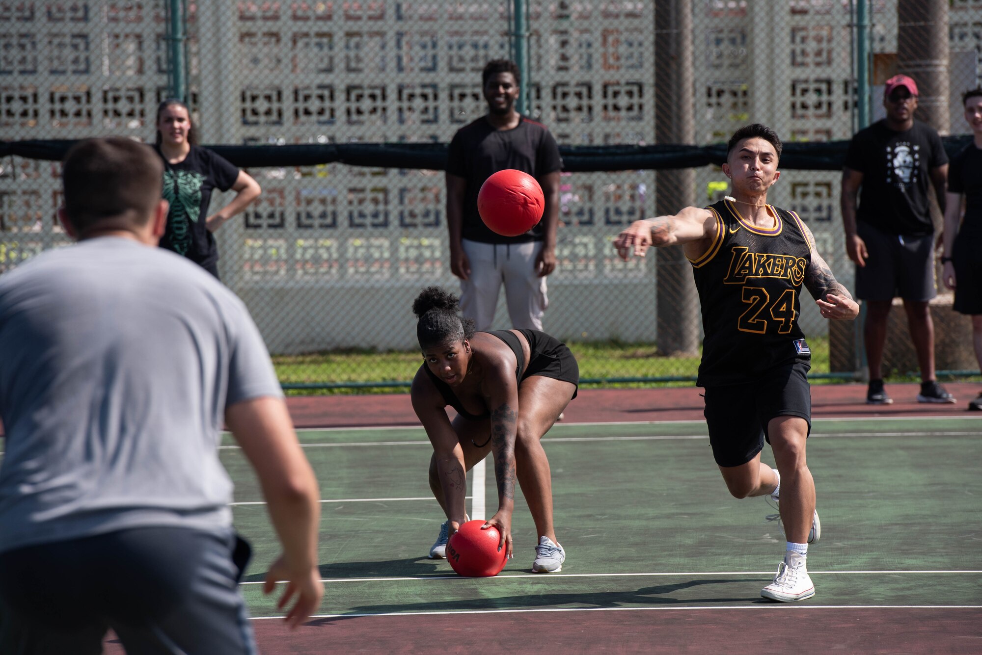 Airmen play dodgeball.