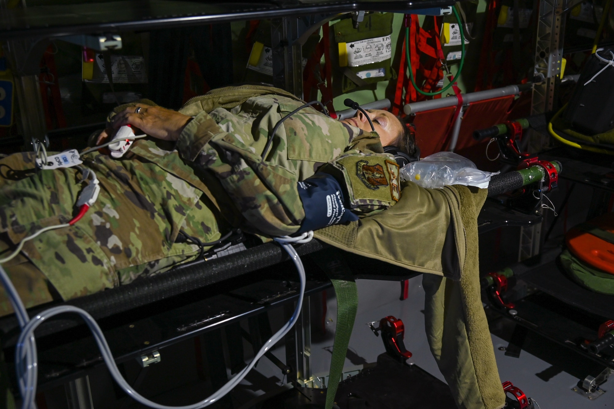 Aeromedical evacuation technicians with the 137th Aeromedical Evacuation Squadron, treats a simulated patient during a casualty transportation scenario on a 507th Air Refueling Wing KC-135 Stratotanker from the 507th Air Refueling Wing, Tinker Air Force Base, Okla., June 9, 2022. (U.S. Air Force photo by Master Sgt. Grady L. Epperly/Released)