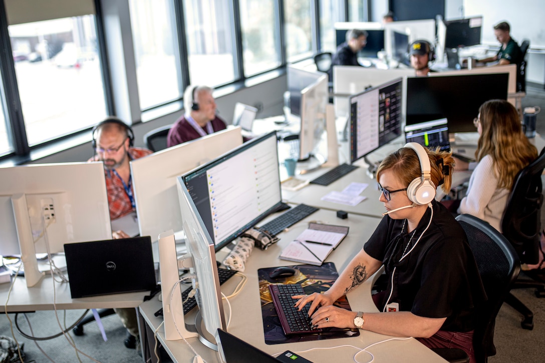 People in computer lab looking at computer screens