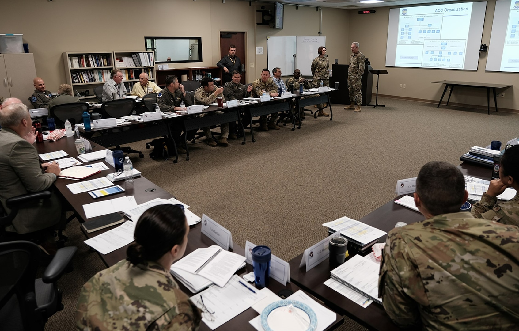 photo of US military personnel sitting at tables