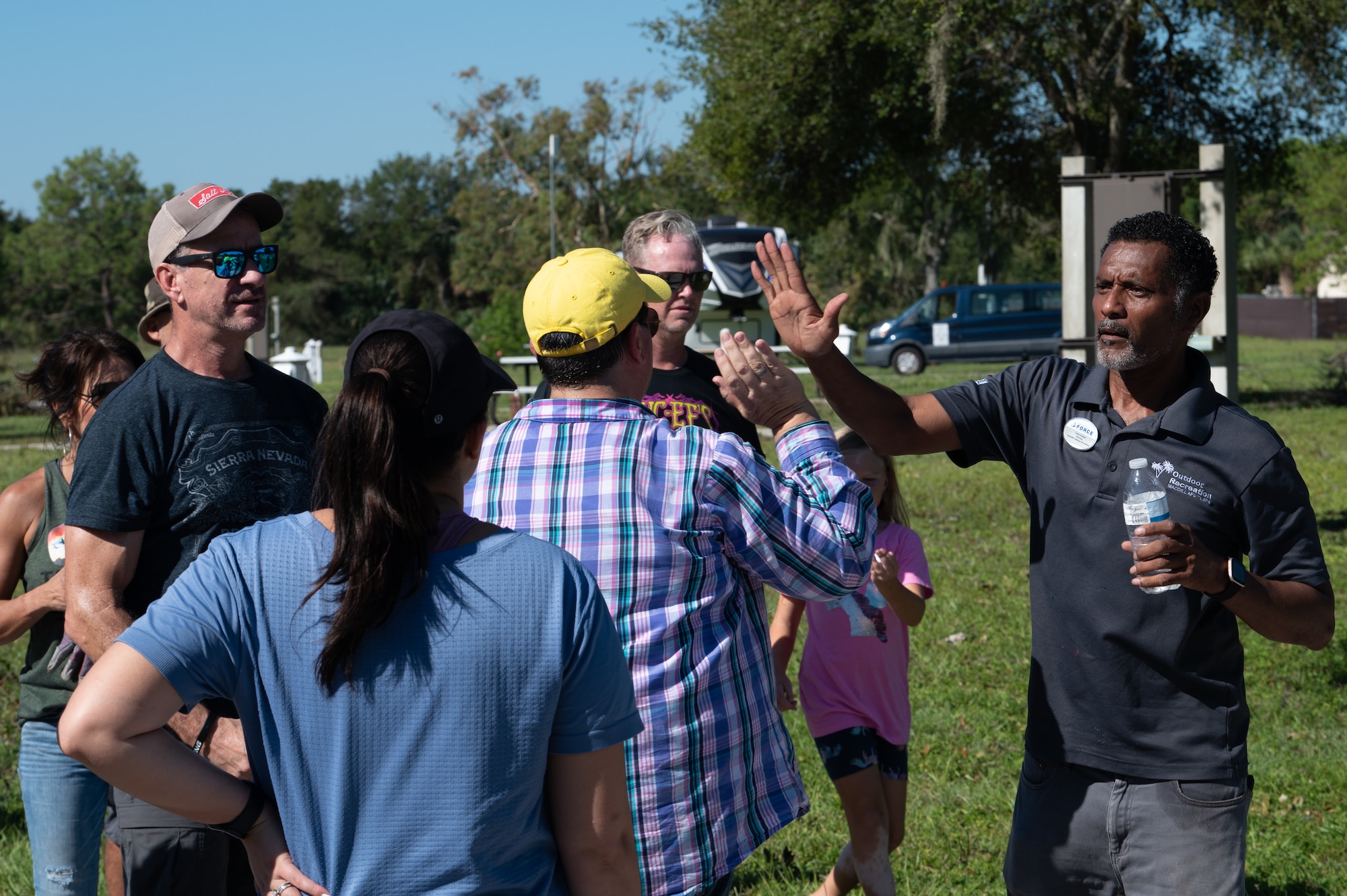 Members of MacDill outdoor recreation finish cleaning for the day
