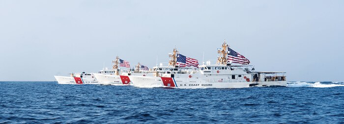 From the left, U.S. Coast Guard fast response cutters USCGC Glen Harris (WPC 1144), USCGC John Scheuerman (WPC 1146), USCGC Emlen Tunnell (WPC 1145) and USCGC Clarence Sutphin Jr. (WPC 1147) transit the Strait of Hormuz, Aug. 22.