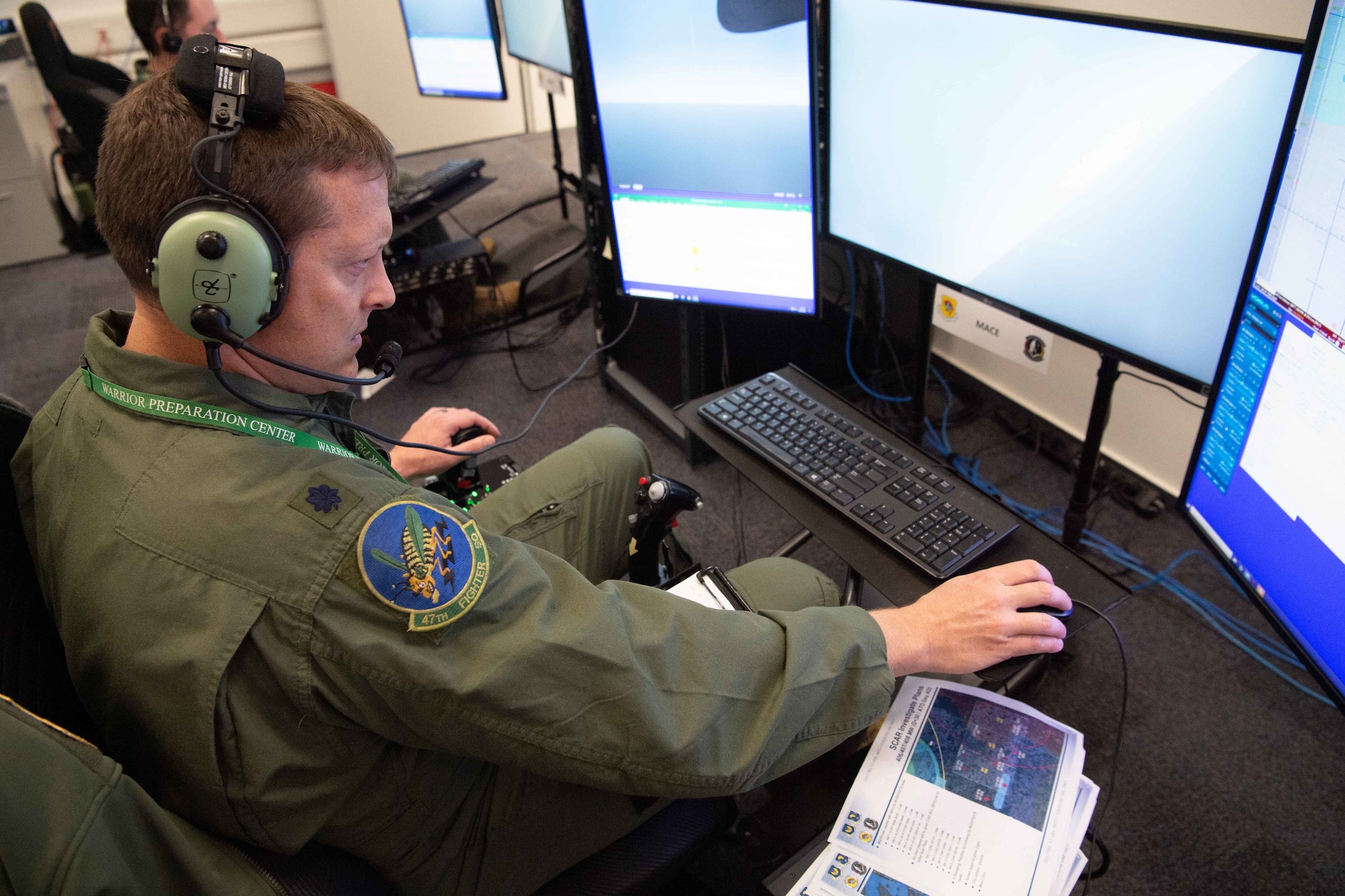 U.S. Air Force Lt. Col. Jake Lillich, 47th Fighter Squadron pilot, operates an aircraft simulator in preparation for exercise Spartan Warrior 22-9