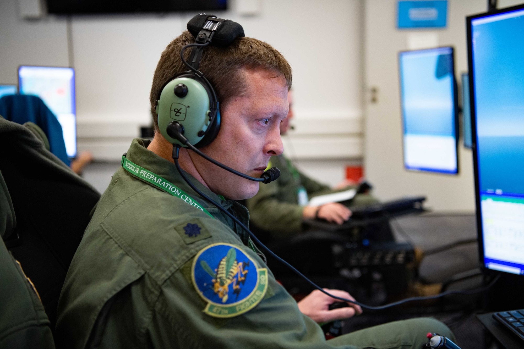 U.S. Air Force Lt. Col. Jake Lillich, 47th Fighter Squadron pilot, operates an aircraft simulator during exercise Spartan Warrior 22-9