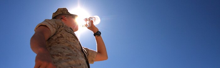 Staying hydrated is the number one key to staying healthy during the summer months. With lack of drinking water, a person can become dehydrated and develop hyponatremia, a deficiency of sodium in the blood. With lack of water in the blazing sun, people can become a heat casualty and suffer from heat cramps, exhaustion and stroke.. Cropped version of 090713-M-5728E-003