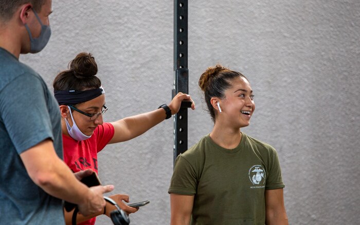 U.S. Marine Corps Cpl. Nahla Beard, an Air Traffic Controller with Headquarters and Headquarters Squadron, attempts a Guinness world record at Marine Corps Air Station Iwakuni, Japan, August 7, 2021. Cpl. Beard won the Guinness world record for most chest-to-ground burpees in one minute.