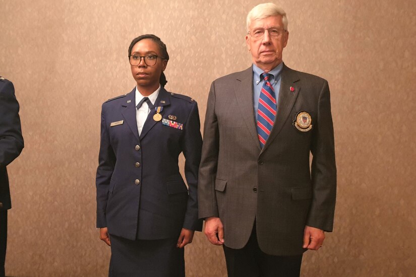 2nd Lt. Jaelin Smith (left) of the 111th Attack Wing stands next to retired Maj. Gen. Wesley Craig, former Adjutant General of Pennsylvania, during the Maj. Octavius V. Catto award ceremony Oct. 1 at the Union League of Philadelphia.
