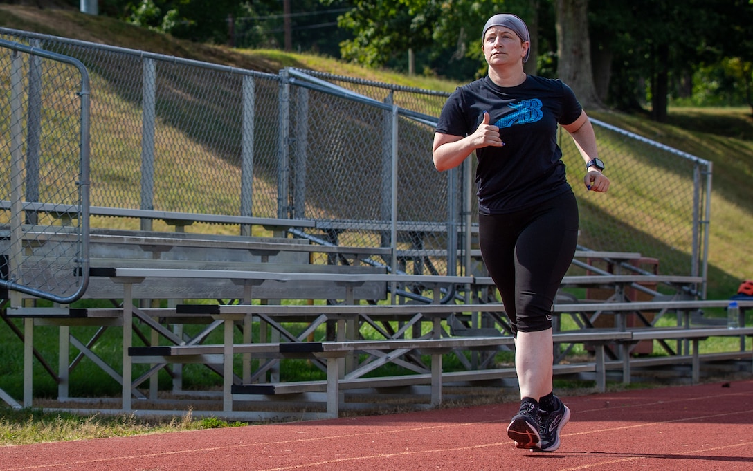 U.S. Marine Corps Gunnery Sgt. Nancy Wright, retired, runs at Butler Stadium on Marine Corps Base Quantico, Virginia, Sept. 19, 2022. Wright will be running in the 47th Marine Corps Marathon. (US Marine Corps photo by Lance Cpl. Kayla LeClaire)