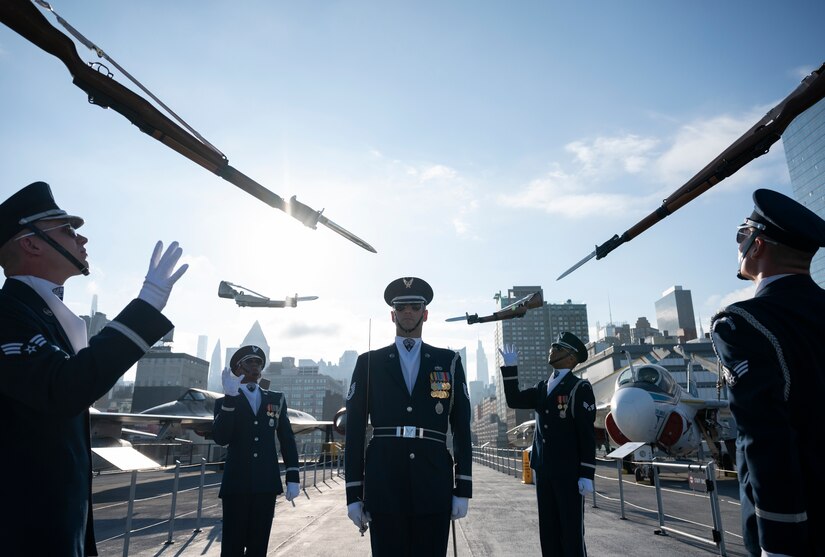 The United States Air Force Honor Guard performs their four-man demonstration on the deck of the Intrepid Sea, Air and Space Museum in New York City, New York, Sept. 18, 2021. The Honor Guard performed the day prior in Times Square, New York City, New York and then live at the Intrepid Sea, Air & Space Museum for the Fox and Friends morning show in commemoration of the Air Force’s 74th Birthday. (U.S. Air Force Photo by Staff Sgt. Kevin Tanenbaum