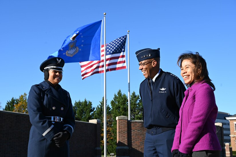 U.S. Air Force Chief of Staff Gen. CQ Brown, Jr., center, and his wife, Sharene, right, speak with U.S. Air Force Airman 1st Class Yoana Laredo-Benitez, United States Air Force Honor Guard, on Joint Base Anacostia-Bolling, Washington, D.C., Nov. 23, 2021. Laredo-Benitez briefed Brown on a demonstration by the U.S. Air Force Honor Guard Drill Team. During the tour, Brown watched team demonstrations and performances by the Honor Guard, The United States Air Force Band and Air Force Arlington National Cemetery Chaplaincy. (U.S. Air Force photo by Airman 1st Class Anna Smith)