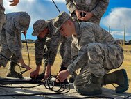 JROTC cadets compete on the Leadership Reaction Course at Camp Williams, Utah, as part of the Wildcat Challenge, Sept. 30, 2022.