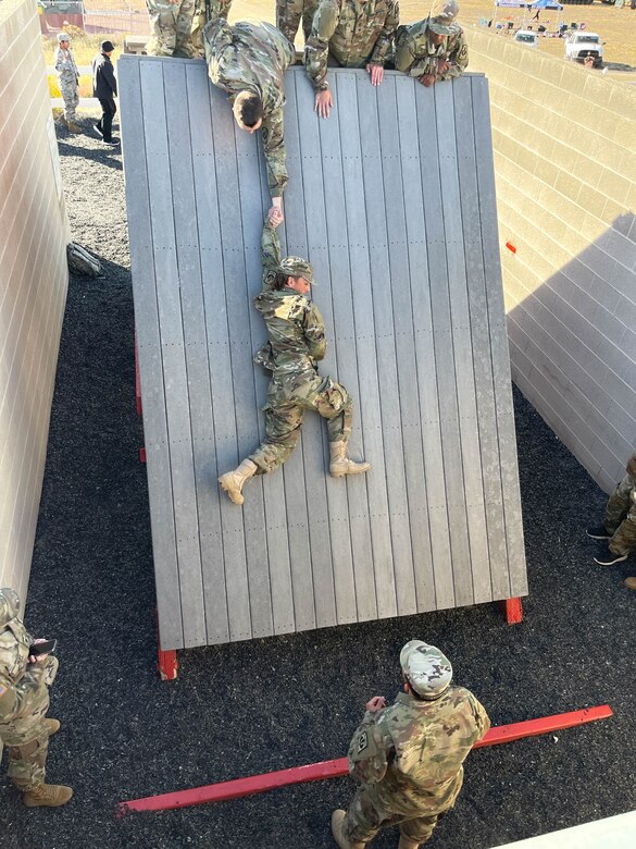 JROTC cadets compete on the Leadership Reaction Course at Camp Williams, Utah, as part of the Wildcat Challenge, Sept. 30, 2022.