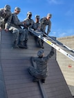 JROTC cadets compete on the Leadership Reaction Course at Camp Williams, Utah, as part of the Wildcat Challenge, Sept. 30, 2022.