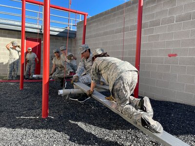 JROTC cadets compete on the Leadership Reaction Course at Camp Williams, Utah, as part of the Wildcat Challenge, Sept. 30, 2022.