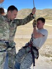 JROTC cadets receive training on the rappel tower at Camp Williams, Utah, as part of the Wildcat Challenge, Sept. 30, 2022.