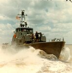 A Coast Guard 82-foot patrol boat underway in the brown water of South Vietnam’s waterways. (U.S. Coast Guard)