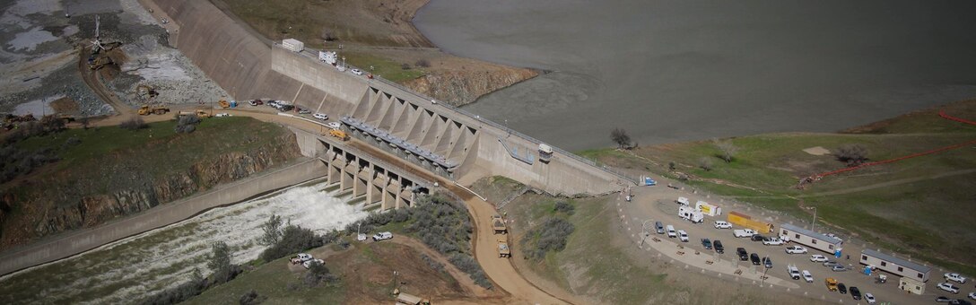 U.S. Soldiers with the California Army National Guard (CAARNG) conduct aerial flood damage assessment from a UH-60 Black Hawk helicopter in Oroville, Calif., Feb. 25, 2017. The CAARNG and federal agencies assisted state officials and local residents in the aftermath of a dam failure near Oroville, California, resulting from record precipitation over several months. (U.S. Army National Guard photo) Cropped version of 170225-D-D0331-002