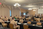 Personnel from Region Legal Service Office Southeast's area of responsibility take part in a meet-and-greet session during the command's three-day training symposium, Aug. 23-25, 2022.