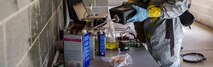 U.S. Marine Corps Sgt. Jay R. Steenbergen, an explosive ordnance disposal (EOD) technician with 2nd EOD Company, 8th Engineer Support Battalion, inspects a homemade explosive lab during an exercise on Camp Lejeune, N.C., Aug. 30, 2017. 2nd EOD worked with chemical, biological, radiological, and nuclear defense specialists during the exercise in a joint effort to improve combat readiness. (U.S. Marine Corps photo by Lance Cpl. Cody J. Ohira) Cropped version of 170830-M-HR246-221