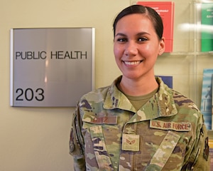 U.S. Air Force Senior Airman Jennifer Lopez, 17th Operational Medical Readiness Squadron public health technician, stands by the public health sign at the Ross Clinic, Goodfellow Air Force Base, Sept. 29, 2022. The 17th OMRS is in charge of food inspections, hearing tests, and analyzing disease trends to ensure the health of all members of the 17th Training Wing. (U.S. Air Force photo by Airman 1st Class Sarah Williams)