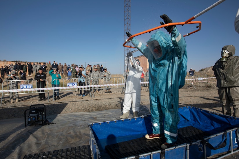 A Mongolia National Emergency Management Agency team demonstrates hazmat decontamination procedures during exercise Gobi Wolf 2022 in Bayankhongor, Mongolia, Sept. 10. Gobi Wolf is a multilateral humanitarian assistance and disaster relief engagement between military components of the government of Mongolia and U.S. Army Pacific. Participating countries also include Bangladesh, Nepal, Sri Lanka, Thailand, the United Kingdom and Vietnam. (Alaska National Guard photo by Victoria Granado)