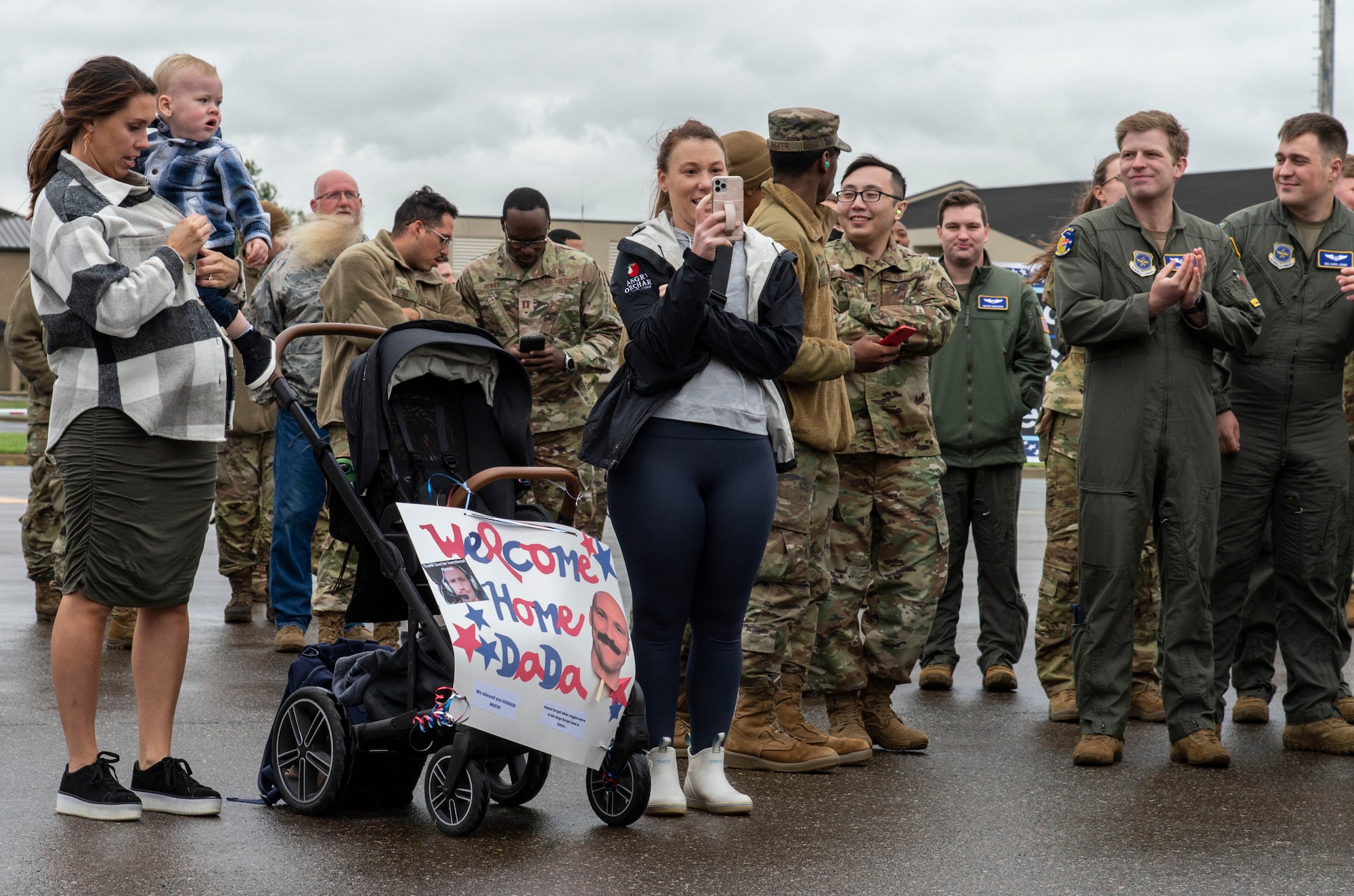 Family, fellow squadron and Team Dover members wait for deployed personnel to deplane at Dover Air Force Base, Delaware, Oct. 3, 2022. Deployed personnel were greeted upon returning to Dover after being deployed to Al Udeid Air Base, Qatar. (U.S. Air Force photo by Roland Balik)