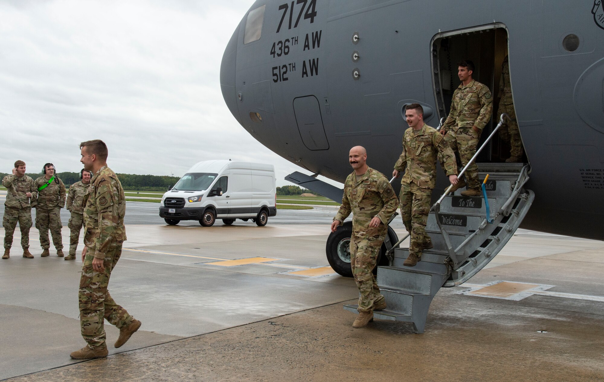 Deployed personnel deplane a C-17 Globemaster III at Dover Air Force Base, Delaware, Oct. 3, 2022. Team Dover members returned to Dover after being deployed to Al Udeid Air Base, Qatar. (U.S. Air Force photo by Roland Balik)