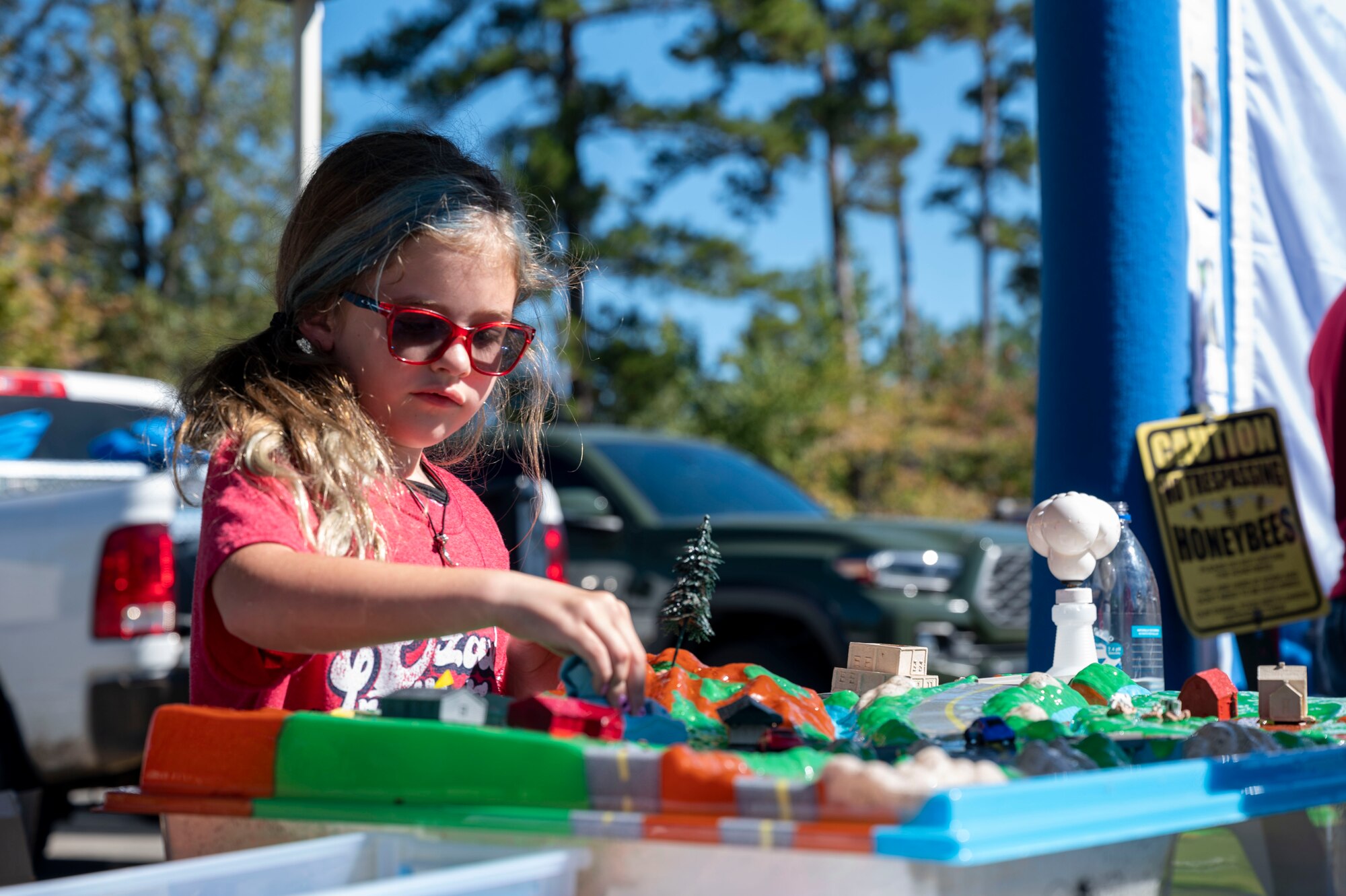 A child interacts with a display