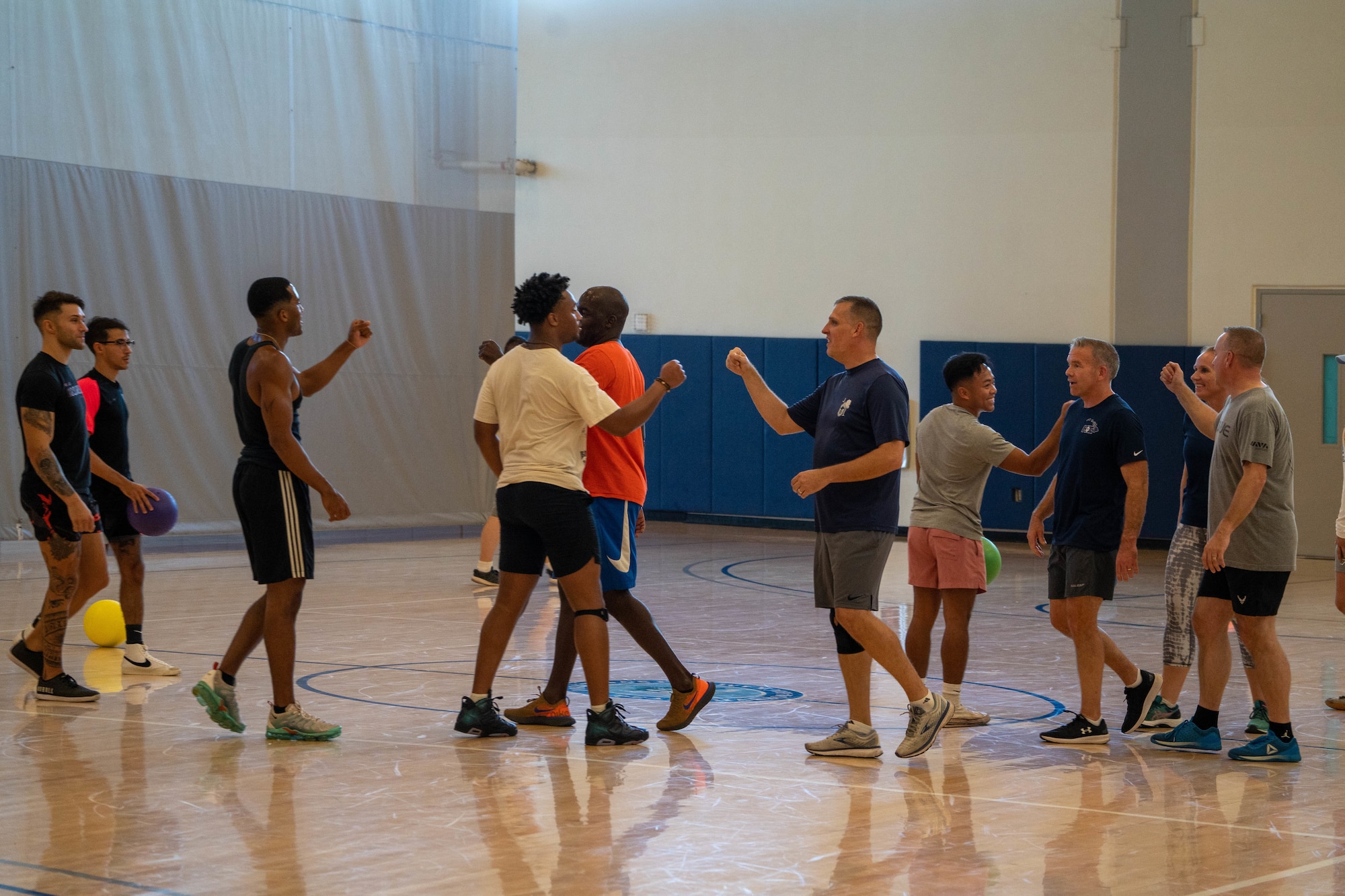 Airmen participate in a dodgeball tournament at Joint Base Pearl Harbor-Hickam, Hawaii, Sept. 30, 2022. The Violence Prevention Office coordinated the tournament to increase awareness of Suicide Prevention Month. (U.S. Air Force photo by Senior Airman Makensie Cooper)