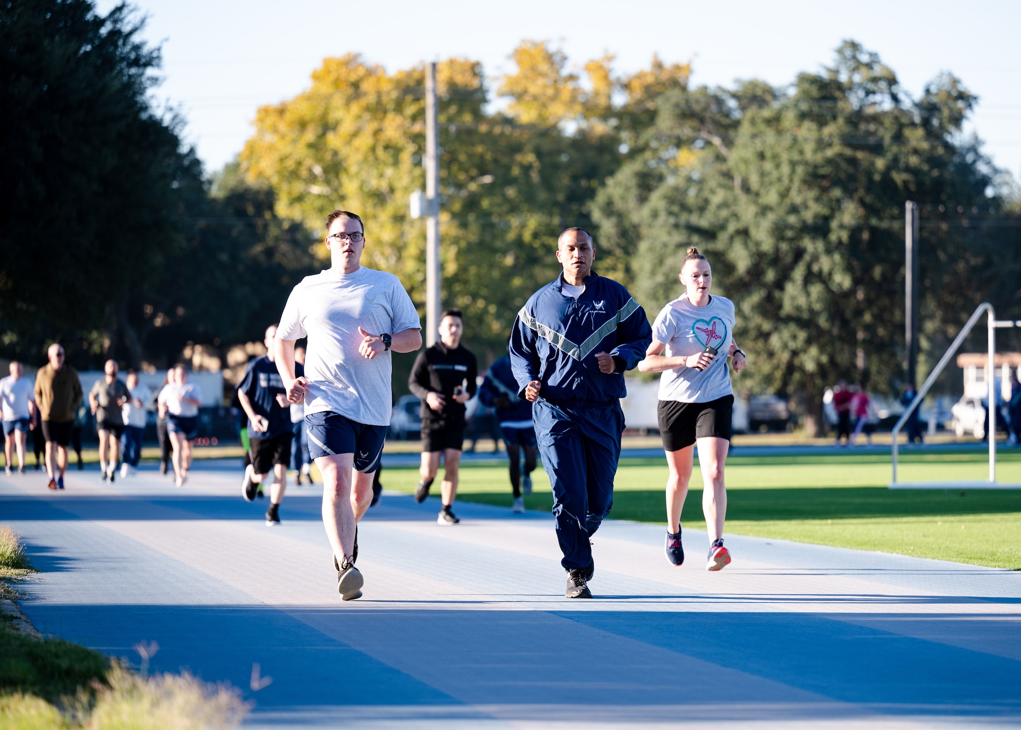 . Airmen ran at the base fitness center to promote mental health and suicide awareness.