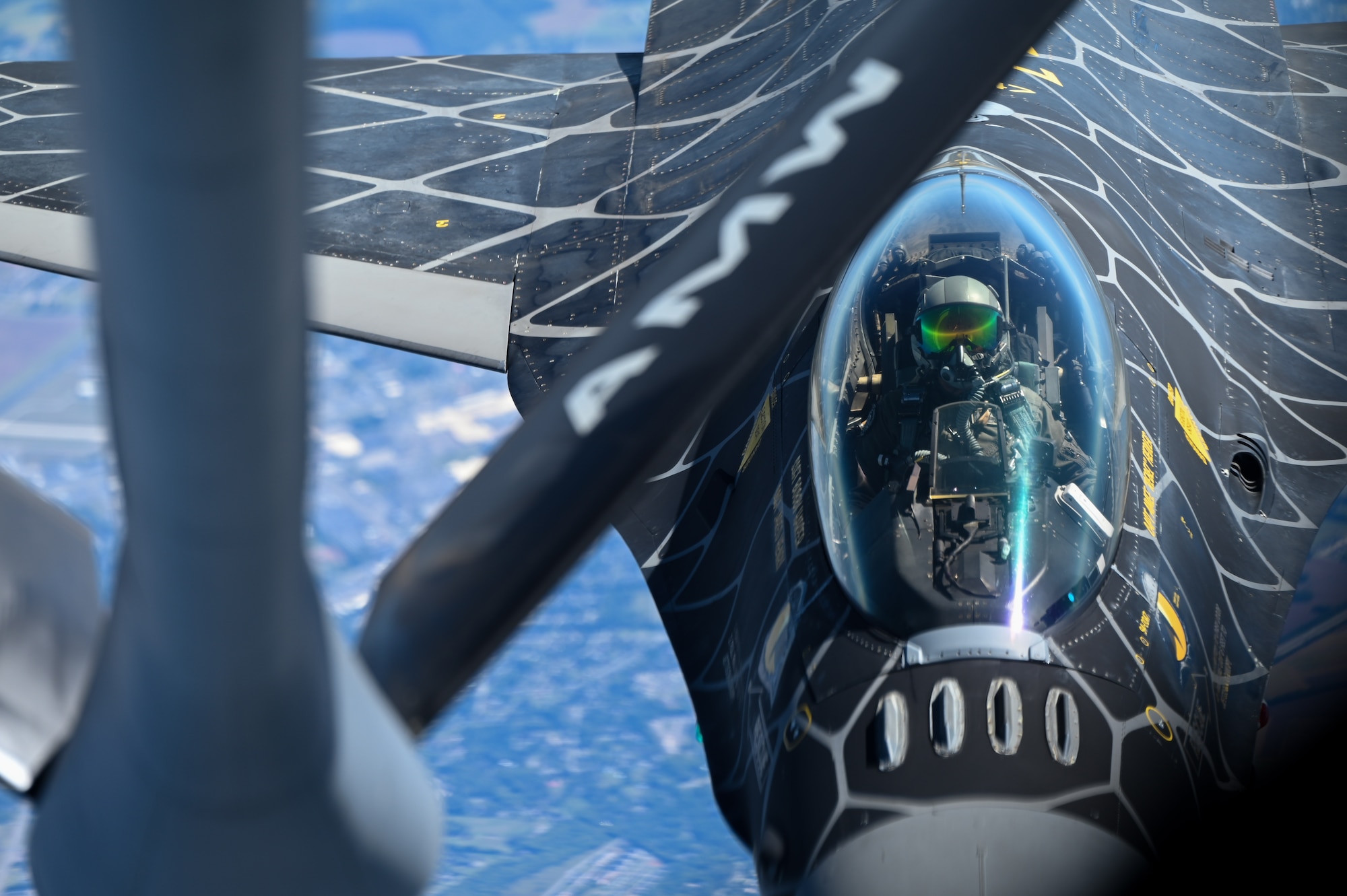 An F-16 Fighting Falcon with the Viper Demonstration Team at Shaw Air Force Base (AFB), South Carolina, lines up with a KC-135 Stratotanker from Altus AFB, Oklahoma, to receive fuel Sept. 29, 2022. An F-16 holds 450 gallons, or about 3,060 pounds of fuel. (U.S. Air Force photo by Senior Airman Kayla Christenson)