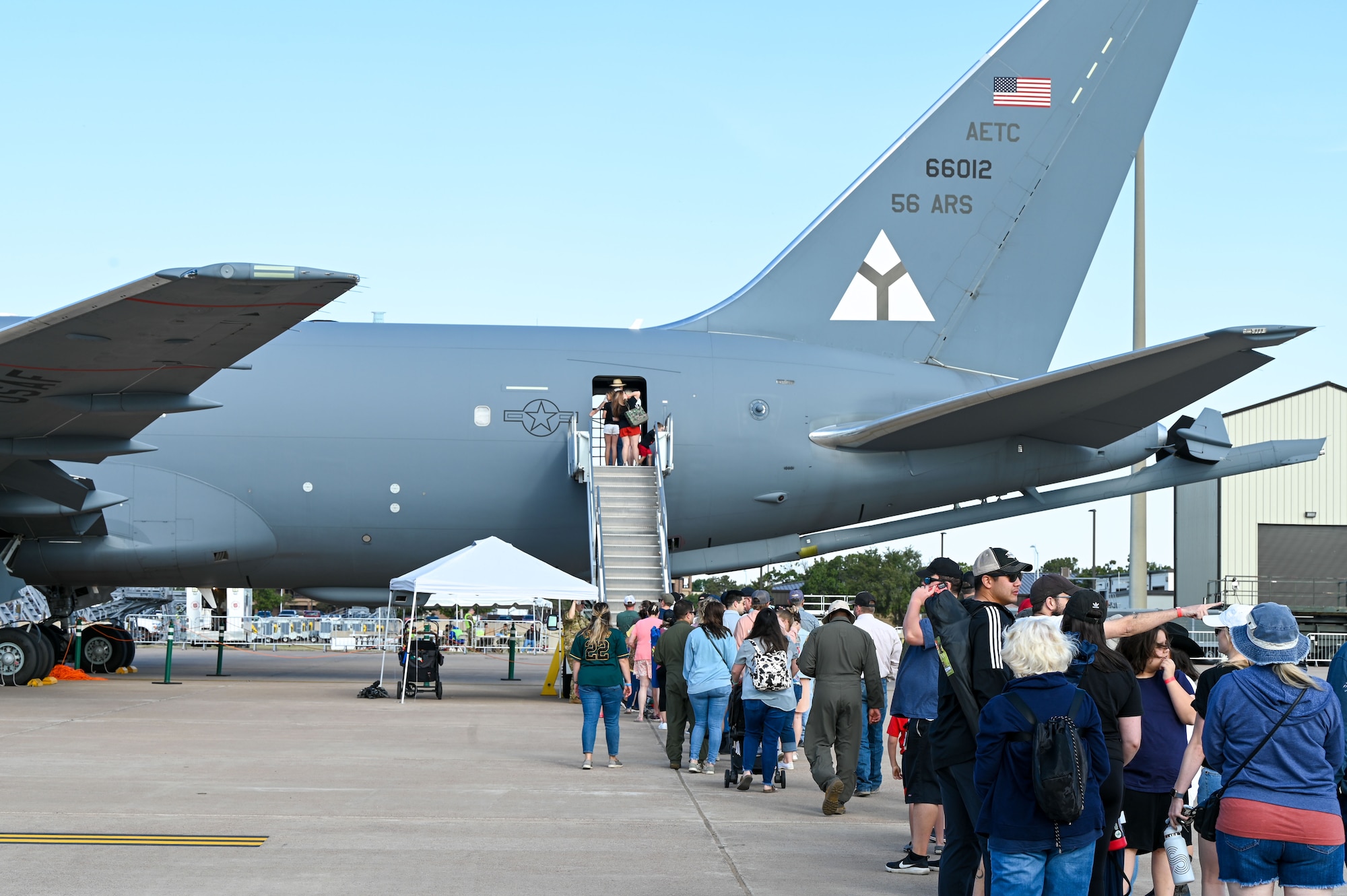 A KC-46 Pegasus sits on the flightline at Altus Air Force Base, Oklahoma, Oct. 1, 2022, during the Red River Thunder airshow. KC-46 pilots and boom operators gave a tour of the aircraft to airshow attendees. (U.S. Air Force photo by Senior Airman Kayla Christenson)