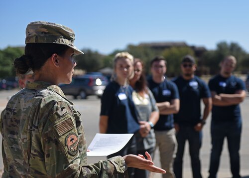 U.S. Air Force Senior Airman Jennifer Lopez, 17th Operational Medical Readiness Squadron public health technician, outlines the duties and mission of the 17th Medical Group to members of the delayed entry program at the Ross Clinic, Goodfellow Air Force Base, Sept. 29, 2022. The mission of the 17th MDG is to ready medics for a ready Air and Space Force. (U.S. Air Force photo by Airman 1st Class Sarah Williams)
