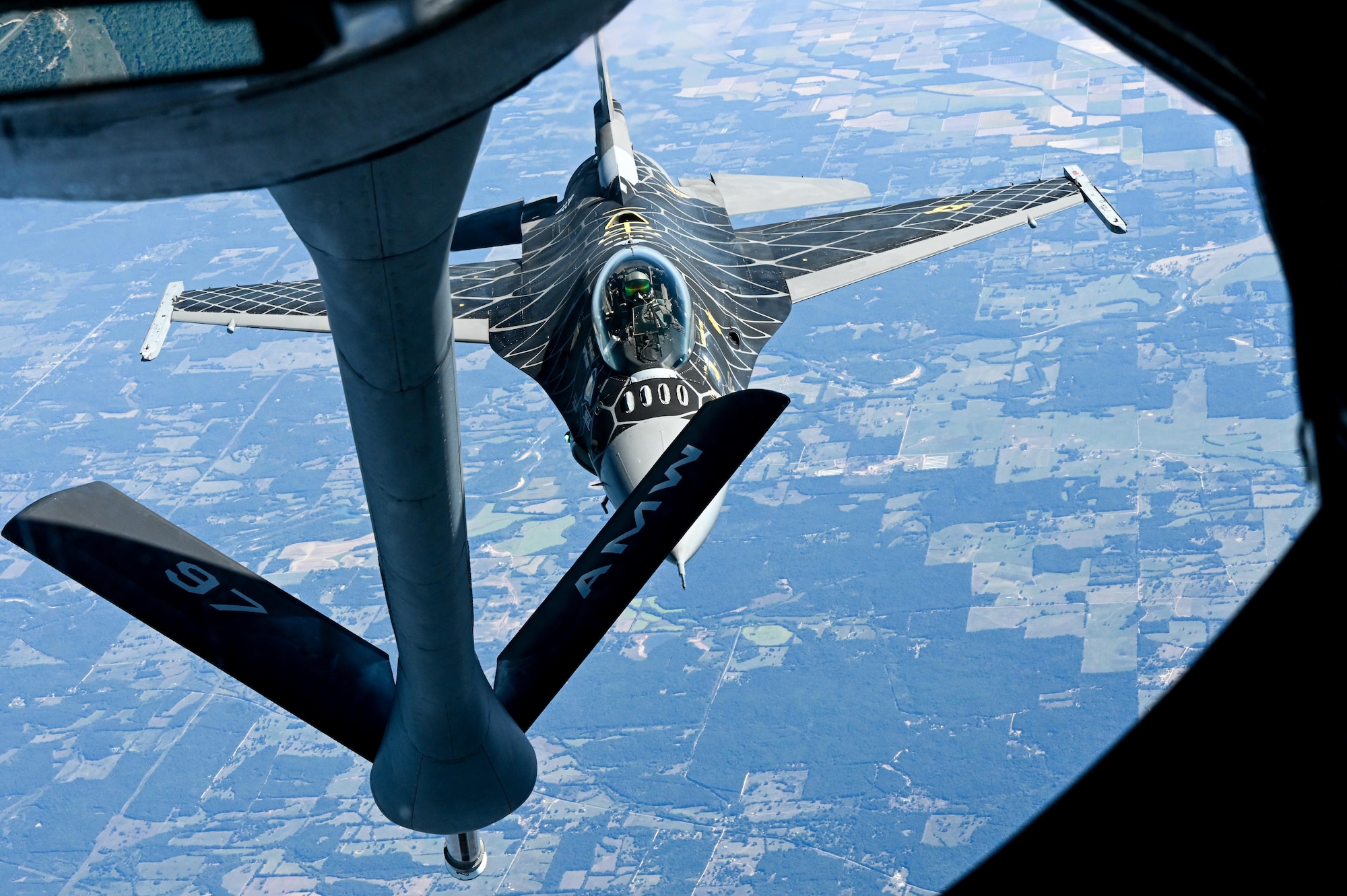 An F-16 Fighting Falcon with the Viper Demonstration Team at Shaw Air Force Base (AFB), South Carolina, receives fuel from a KC-135 Stratotanker from Altus AFB, Oklahoma, Sept. 29, 2022. The Viper Demonstration Team includes a single-ship F-16 known as “Viper” flown by Capt. Aimee ‘Rebel’ Fiedler, supported by nine other Airmen on the team. (U.S. Air Force photo by Senior Airman Kayla Christenson)