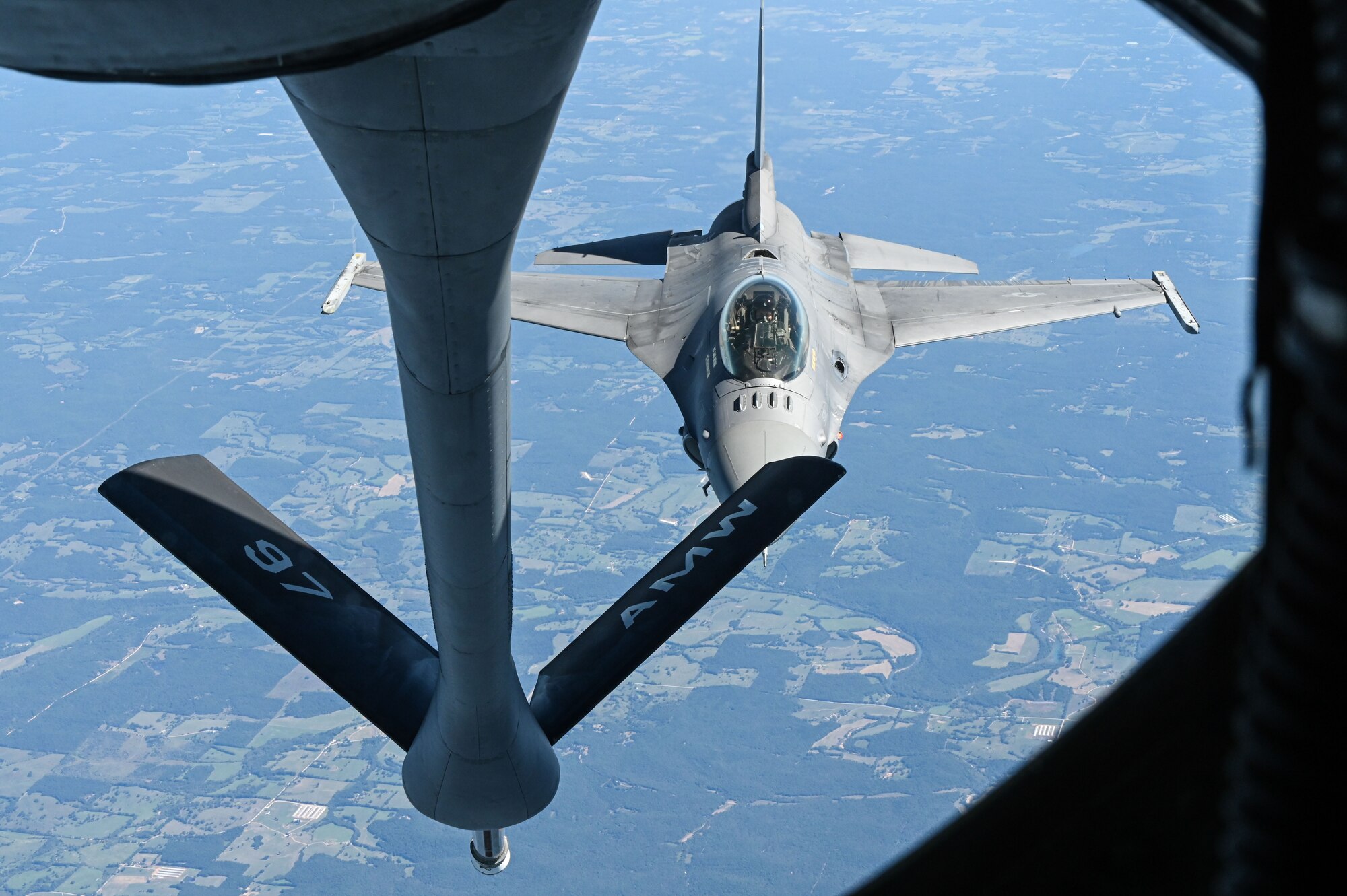 An F-16 Fighting Falcon from Shaw Air Force Base (AFB), South Carolina, receives fuel from a KC-135 Stratotanker from Altus AFB, Oklahoma, Sept. 29, 2022. A second F-16 is flown with the Viper Demonstration Team as a spare if the main F-16 Viper is unable to fly. (U.S. Air Force photo by Senior Airman Kayla Christenson)