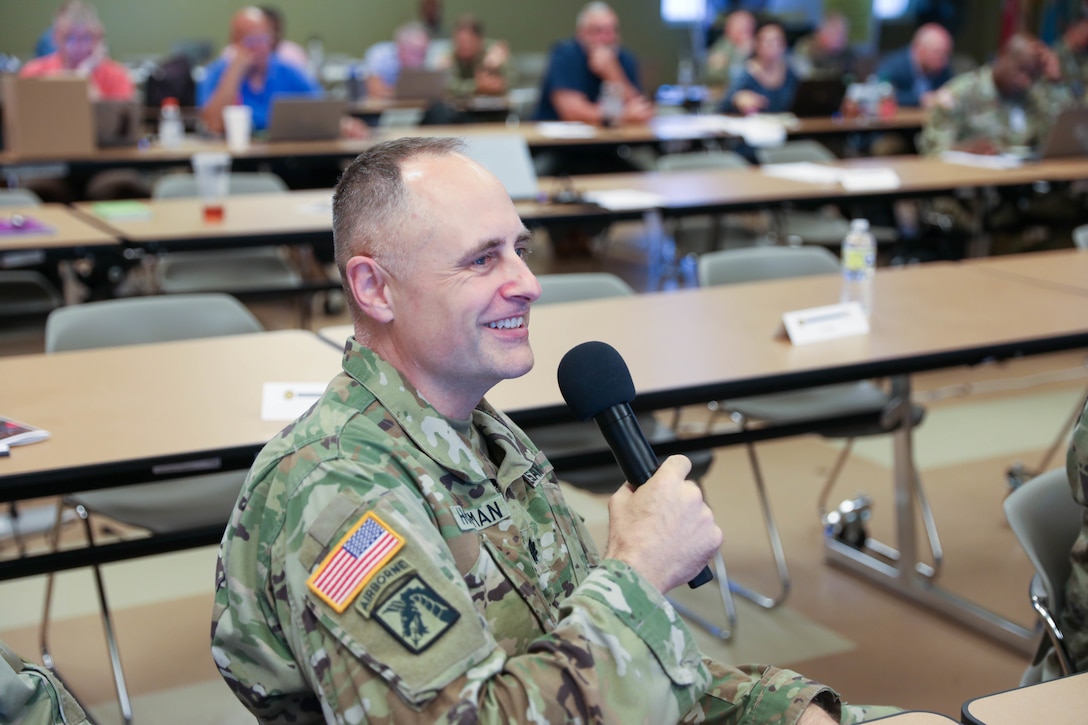 Col. Kelly Johnson, G3, 3rd Medical Command (Deployment Support), brings his unit's capabilities into focus during the U.S. Army Reserve Command Training Summit held 27-29 July, 2022 at the U.S. Army Civil Affairs and Psychological Operations headquarters, Fort Bragg, NC. (U.S. Army Reserve photo by Sgt. 1st Class Lisa M. Litchfield)