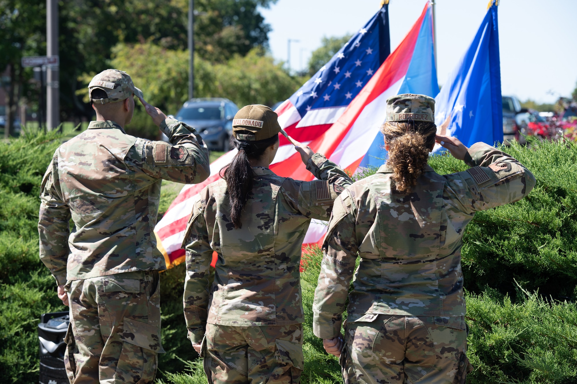 1st Lt. Joaquin Diaz, 1st Lt. Rebecca Maldonado, and Capt. Noraliz Rodriguez-Alicea, all natives of Puerto Rico, took oaths of office in both English and Spanish during their promotion ceremonies at Hanscom Air Force Base, Mass., Sept. 15. The event, which featured a history lesson on the contributions of Puerto Ricans to the Department of Defense, and a reception with traditional Puerto Rican food and drinks, was part of Hanscom’s commemoration of National Hispanic Heritage Month, which runs from Sept. 15 to Oct. 15. (U.S. Air Force photo by Jerry Saslav)