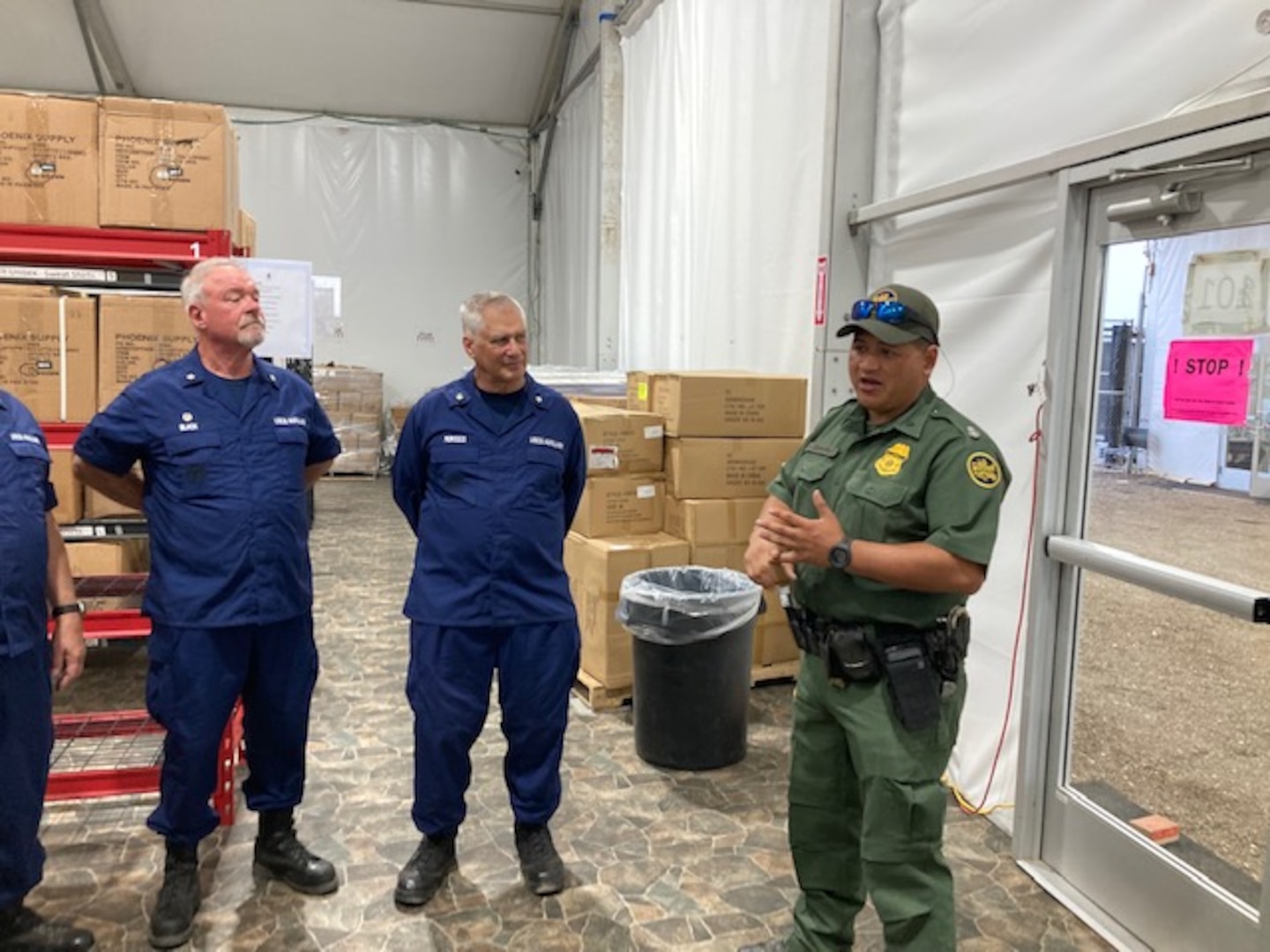 Auxiliarist Fred Black, Auxiliarist Wes Morosco, and Customs and Border Protection watch commander Anthony Cabarillo conduct an introduction meeting for the second wave of Auxiliary volunteers in Eagle Pass, Texas. (Coast Guard Auxiliary Photo by Commodore Tracy DeLaughter)