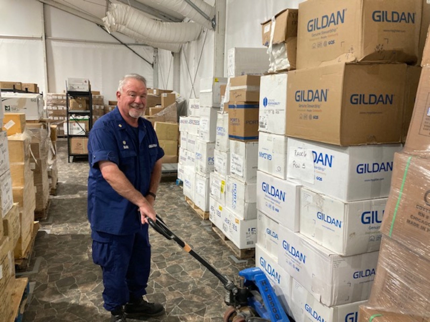 Auxiliarist Fred Black works the pallet hack in the warehouse at Eagle Pass Station, Texas. (Coast Guard Auxiliary Photo by Commodore Tracy DeLaughter)