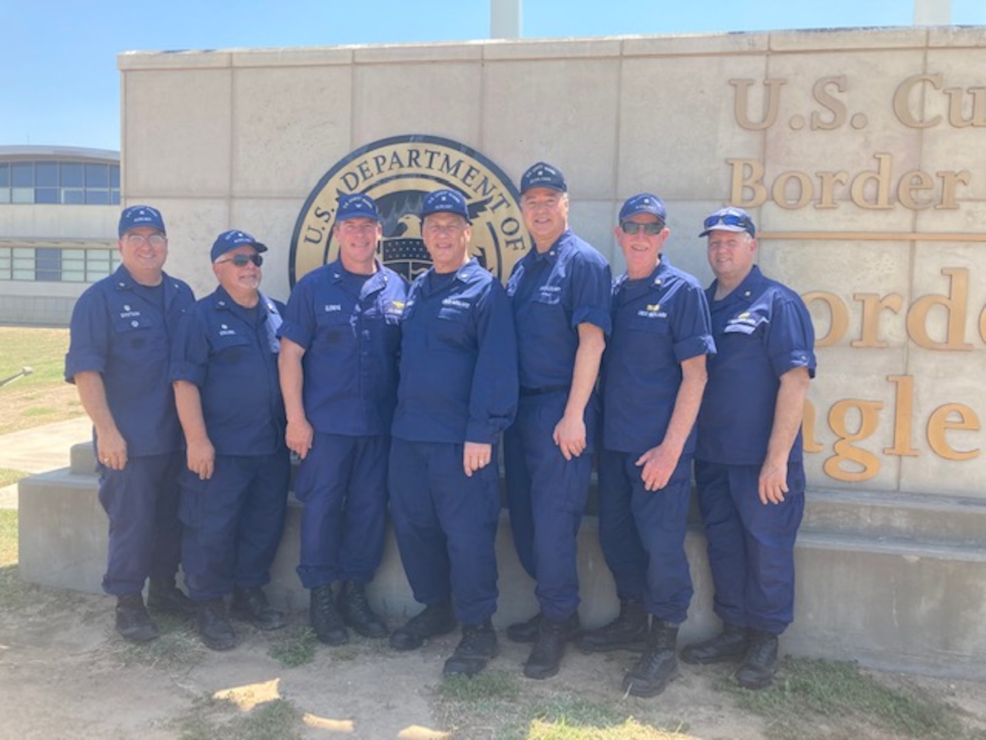 Capt. Troy Glendye, Chief Director of Auxiliary, and the second wave of Auxiliarists stand outside of Eagle Pass Station in Eagle Pass, Texas. (Coast Guard Auxiliary Photo by COMO Tracy DeLaughter)
