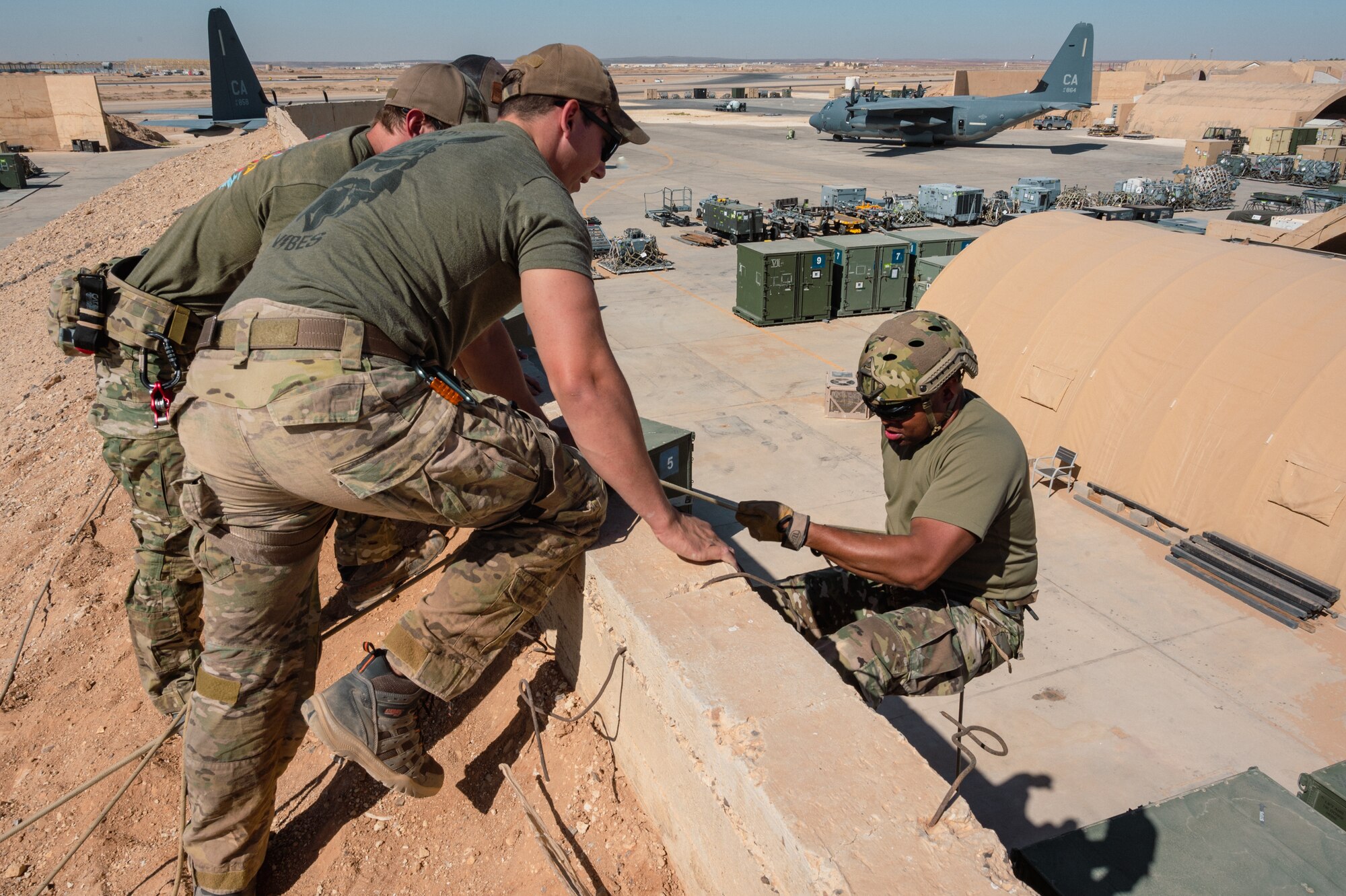 U.S. Air Force Personnel Recovery Task Force members assigned to the 52nd Expeditionary Rescue Squadron, showcase a technical rescue and rappel operation as part of the “Red Tail Connection” program at an undisclosed location, September 28, 2022. These immersion visits provide greater insight into the unique skillsets every Airman brings to the 332d AEW Red Tail team. (U.S. Air Force photo by Tech. Sgt. Richard Mekkri)