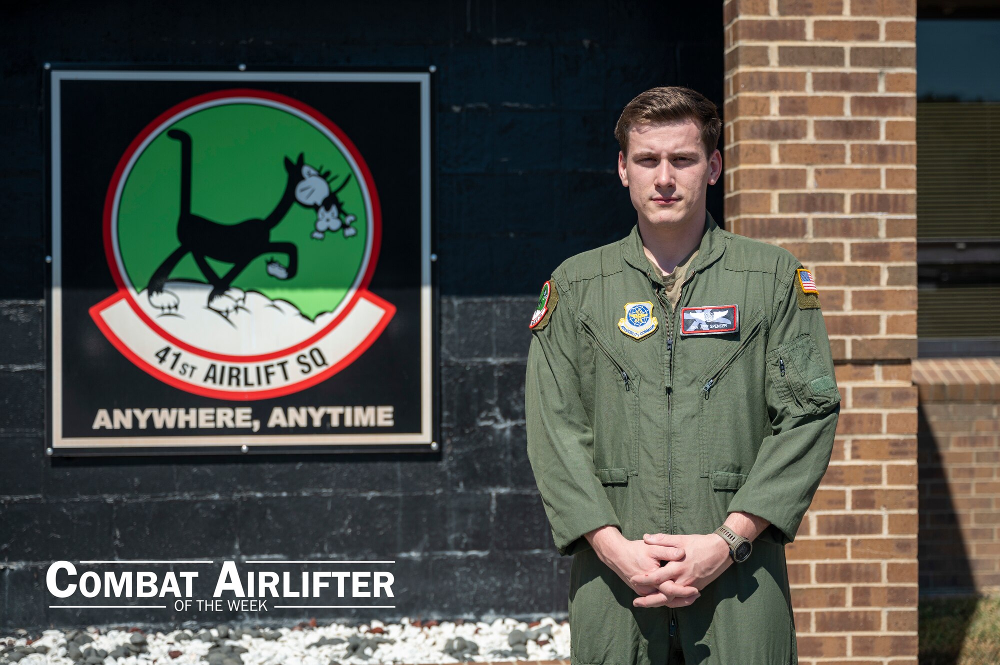 A man in uniform poses for a photo