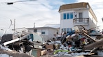 Buildings with scattered debris.