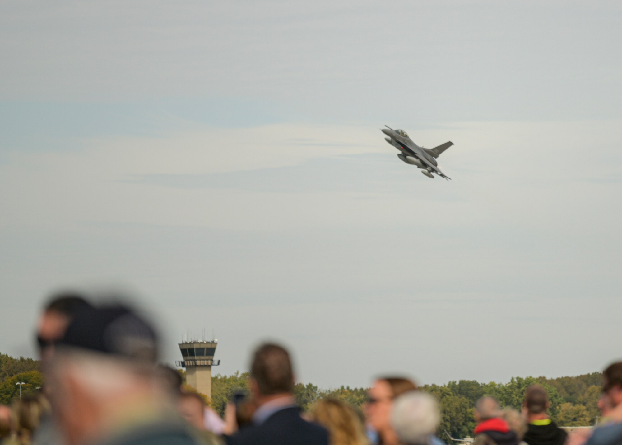 F-16 Fighting Falcon aircraft assigned to the Wisconsin Air National Guard's 115th Fighter Wing, overfly Truax Field, Madison, Wisconsin during a ceremony commemorating the units final departure with the aircraft Oct. 5, 2022. The F-16 first arrived at Truax Field in 1992 as the eighth primary airframe since the units inception in 1948 and is scheduled to be replaced by the F-35 Lightning II aircraft in the Spring of 2023. (U.S. Air National Guard photo by Staff Sgt. Cameron Lewis)