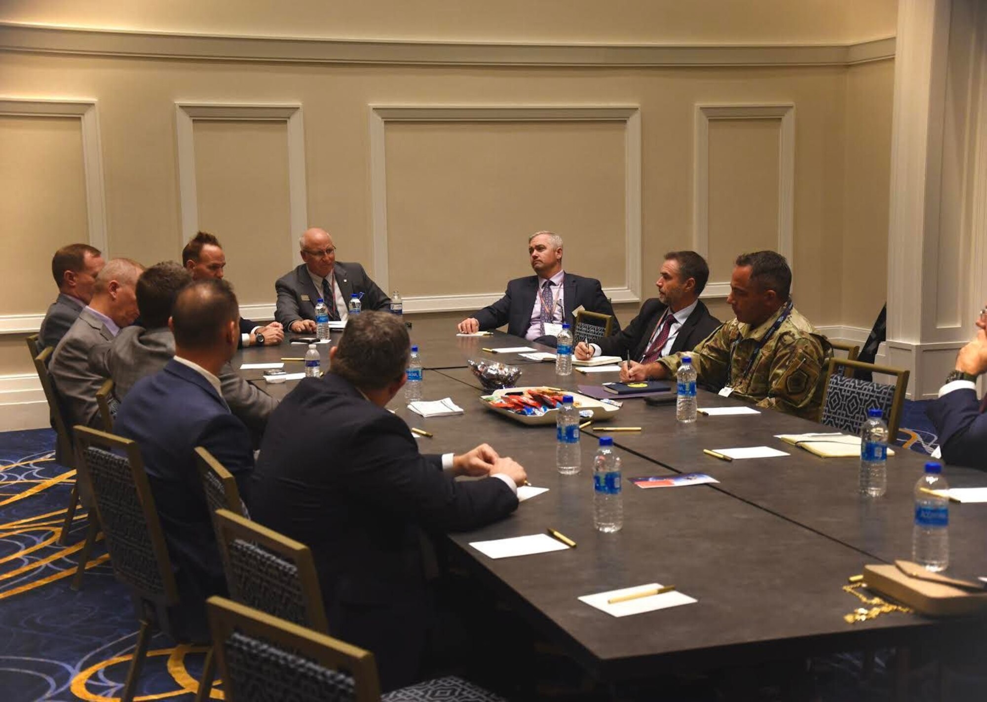 U.S. Air Force Col. Josh Koslov, 350th Spectrum Warfare commander, meets with representatives from BAE Systems to discuss the 350th SWW’s Electromagnetic Spectrum based mission and potential future collaboration between the wing and industry at the Air & Space Forces Association Air, Space & Cyber Conference in Washington D.C., Sept. 19, 2022. The 350th SWW attended the conference to not only moderate an Electromagnetic Warfare (EW) panel, but to meet with partners across the DoD and industry to cultivate potential relationships to further the development of lethal EW capabilities to support the warfighter. (U.S. Air Force photo by 1st Lt Benjamin Aronson)