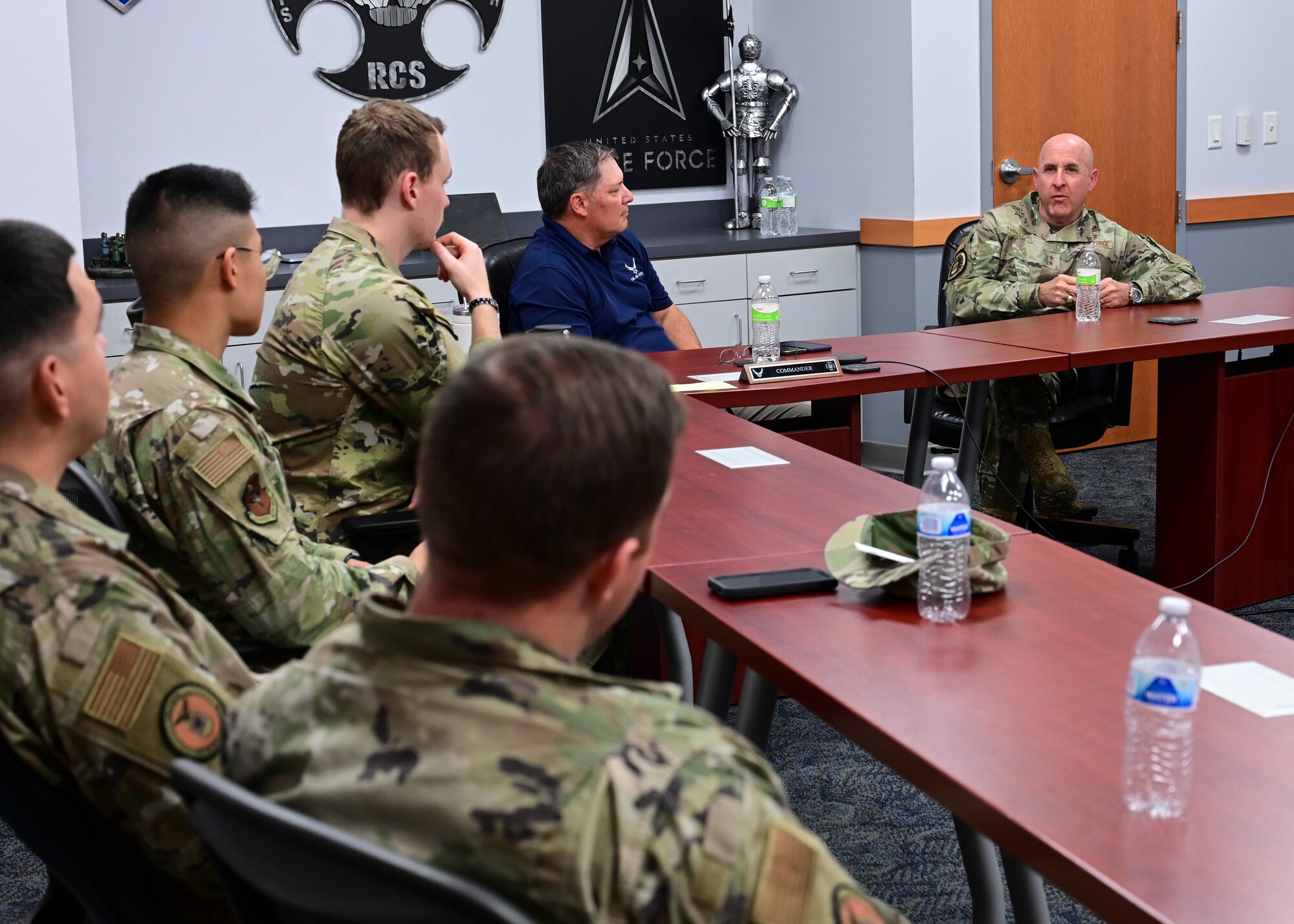 Air Force Recruiting Service commander Maj. Gen. Edward W. Thomas Jr. speaks with members of the 347th Recruiting Squadron